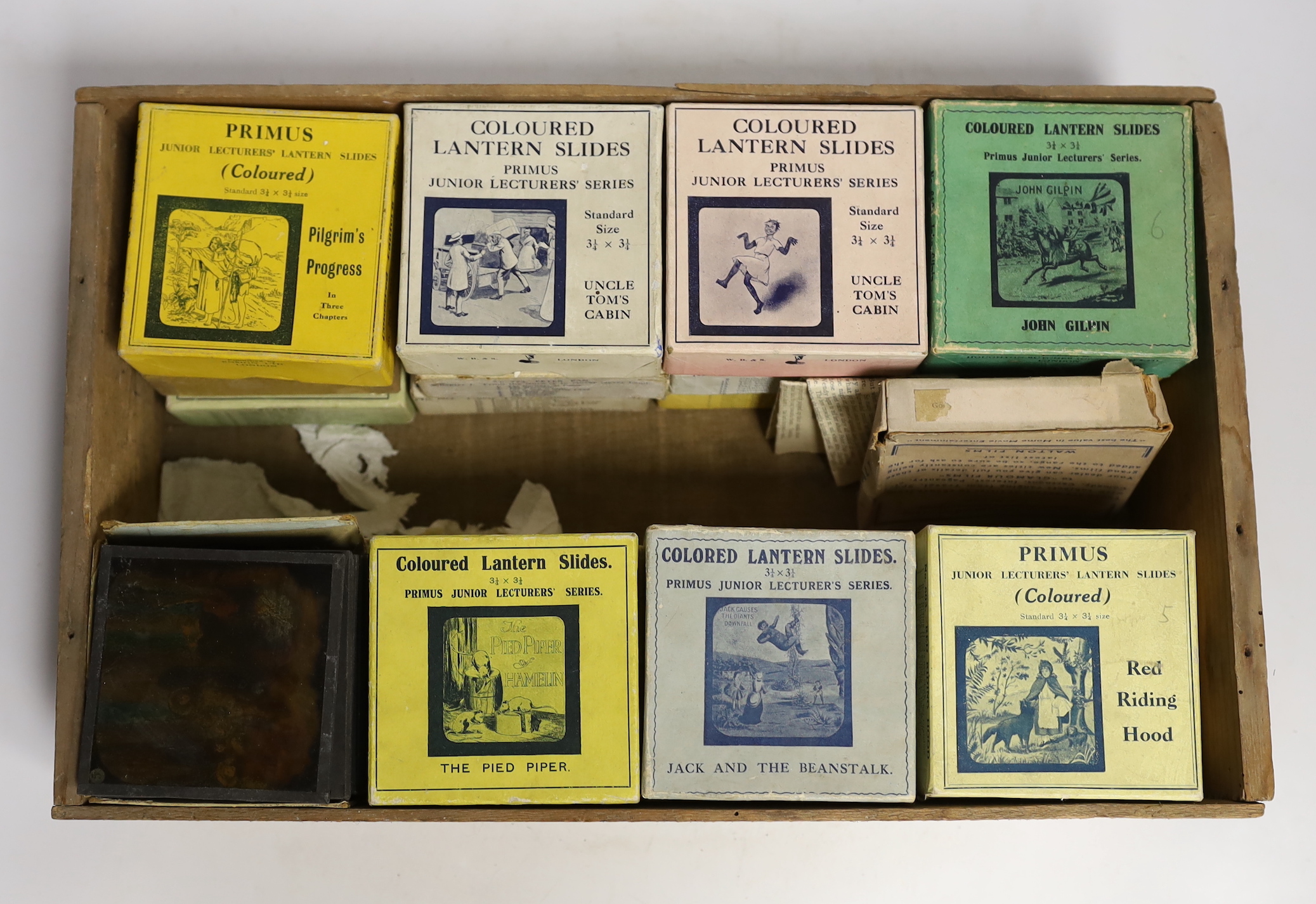 Quantity of boxed magic lantern slides to include Peter Pan, Jack and the beanstalk, Robin Hood etc 24boxes and seven oblong slides